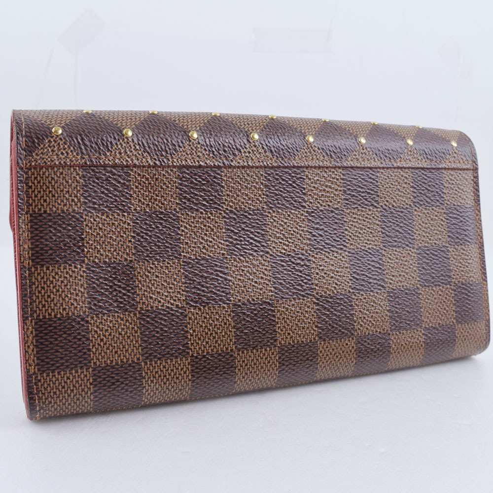 LOUIS VUITTON】ルイ・ヴィトン ポルトフォイユサラ スタッズ N60123 ダミエキャンバス 茶 MI3168 ユニセックス 長財布 【中古】｜LOUIS VUITTON｜店舗買取｜財布/小物＞財布｜USEDのアパレル通販サイト - SMASELL（スマセル）