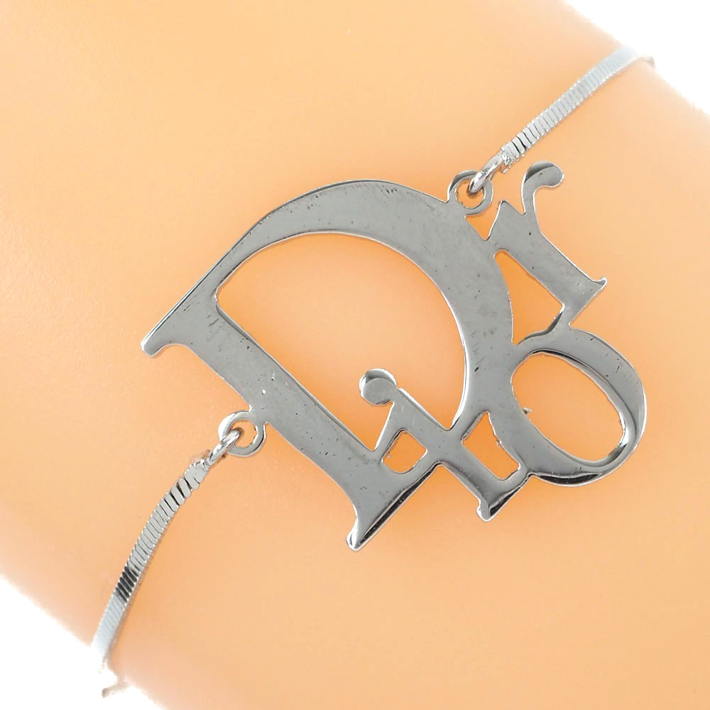 Dior】クリスチャンディオール ロゴ 金属製 シルバー レディース